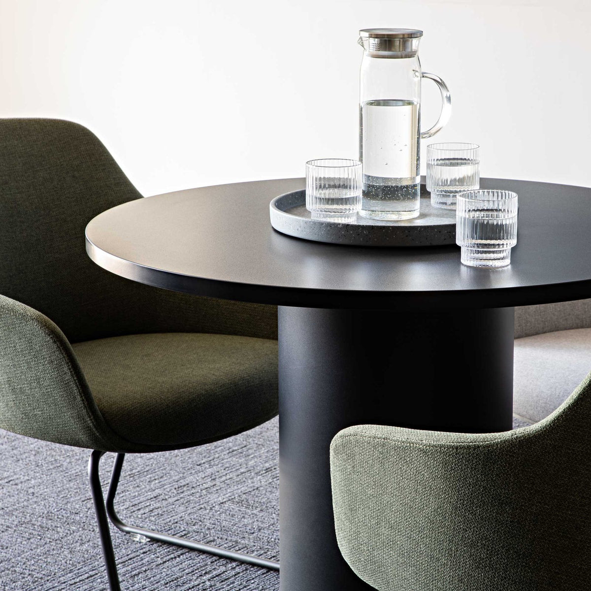 Aspen sled base tub chair at a meeting table
