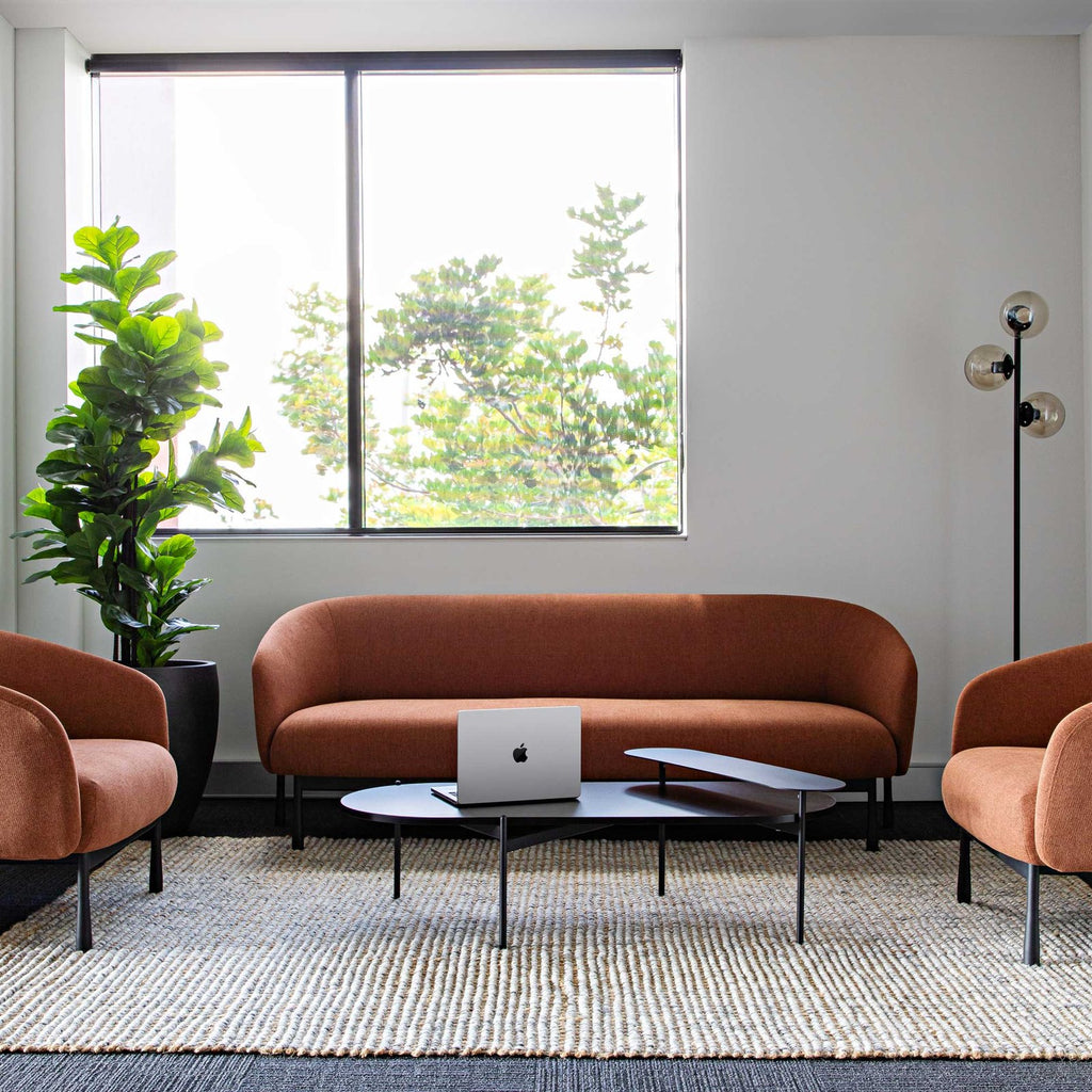 Cosmos 2 Seater Lounge shown in a workplace setting