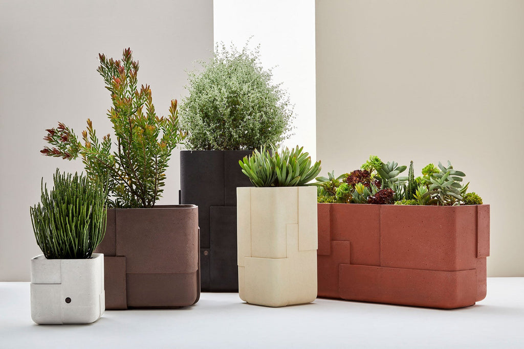 Indigenus Aarde tall, square and trough planters in mixed finishes