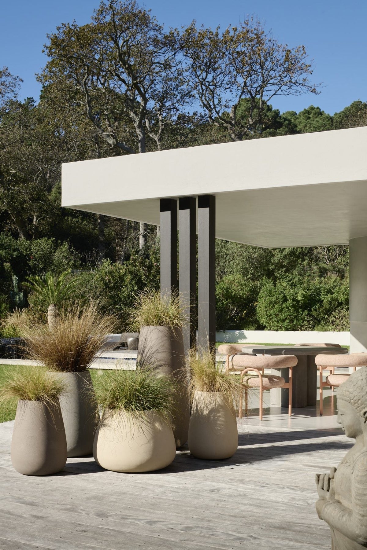 Indigenus Tuber planters at a residential entry