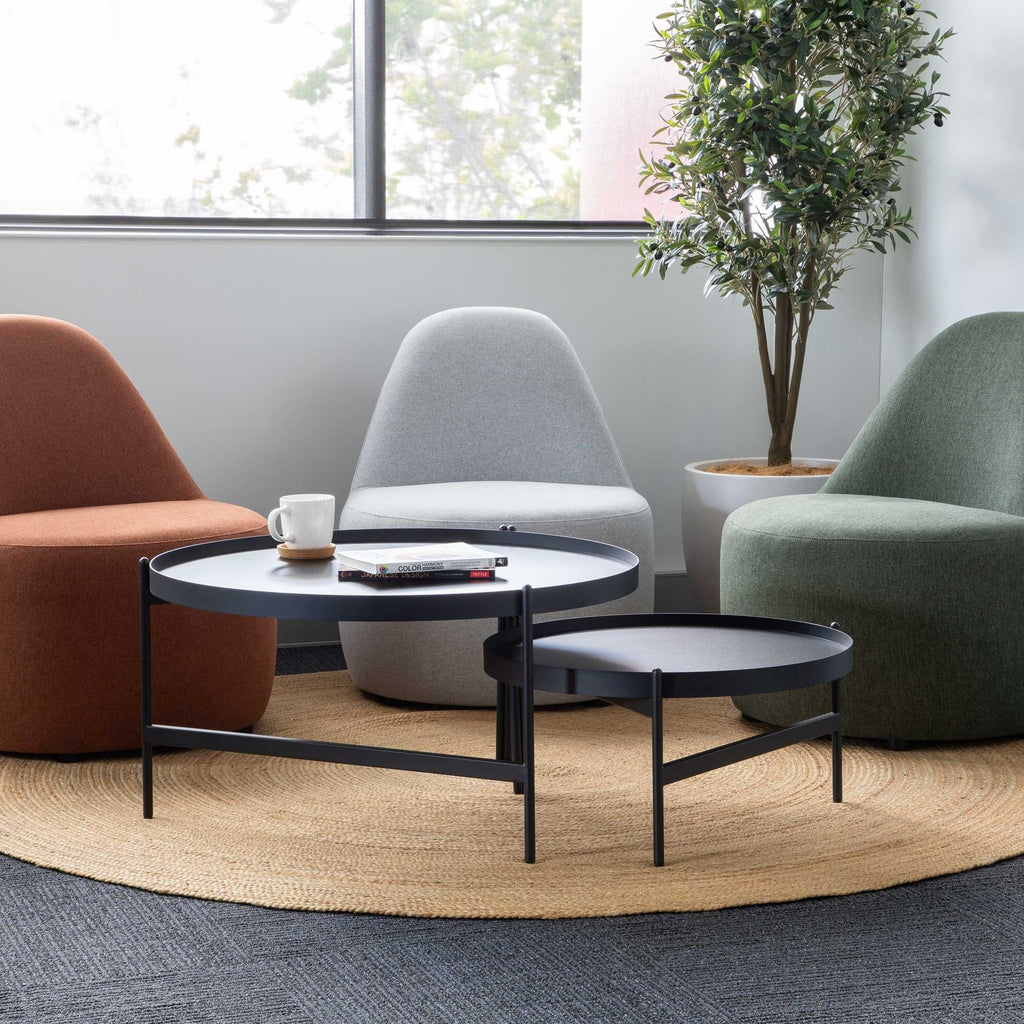 Myk Single Lounge Chair shown in a workplace setting